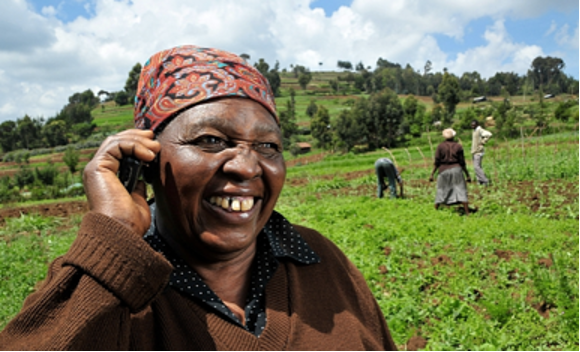 Woman smiling in a field