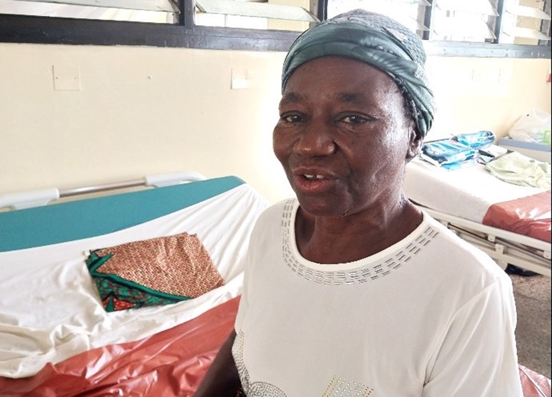Woman sitting on a hospital bed in Nigeria