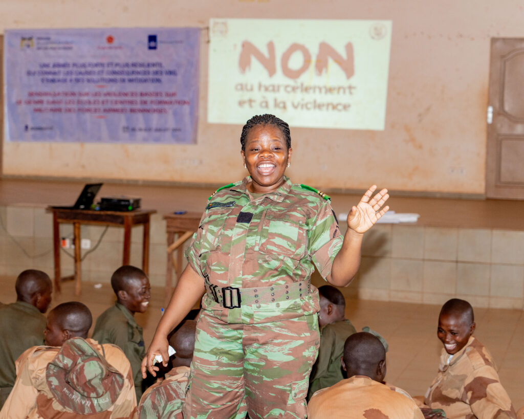 Gender-based violence awareness session taught by female soldier for student soldiers in military school in Benin.