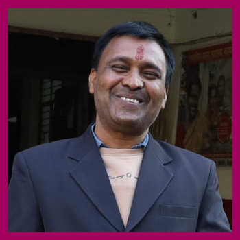 Smiling portrait of Pankaj Kumar of Bihar, India.
